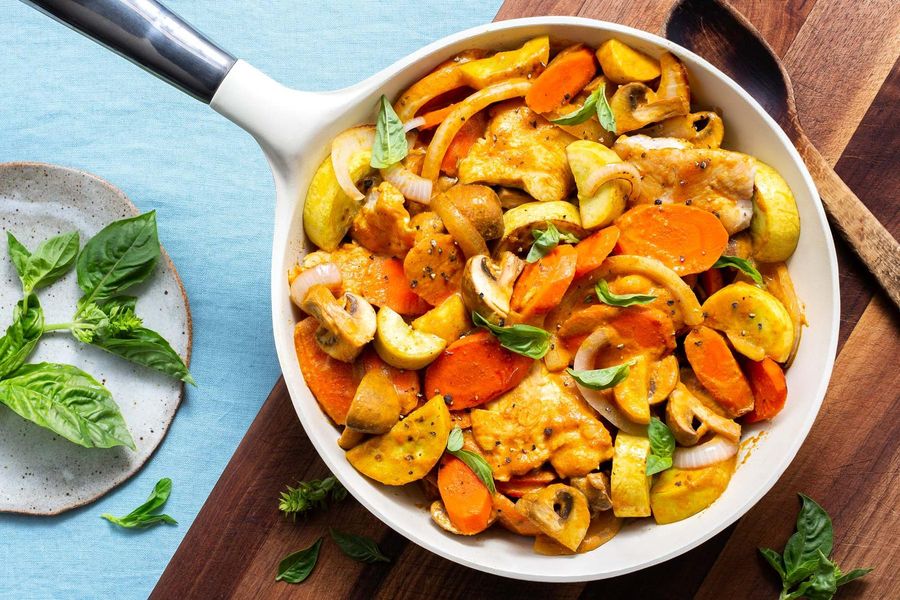 Coconut curried chicken with squash, mushrooms, and basil