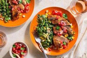 Paprika-spiced chicken over “creamed” corn with tomato salsa