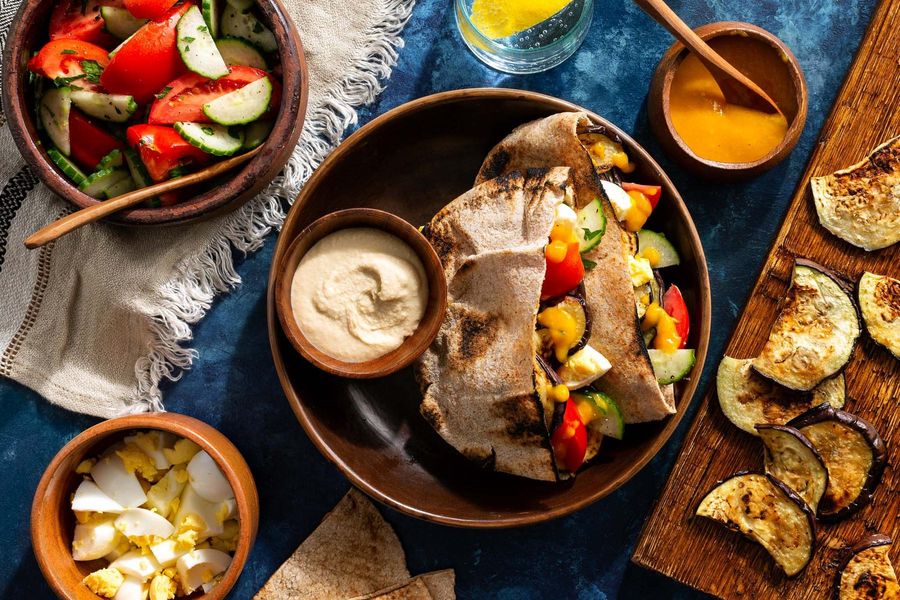 Middle Eastern eggplant pitas with hummus and spicy mango amba sauce