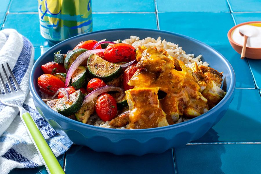 Middle Eastern chicken and brown rice bowl with roasted vegetables
