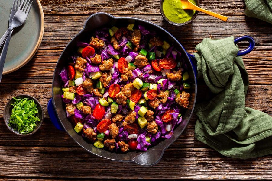 Vegetable skillet with spicy green harissa and your choice of protein
