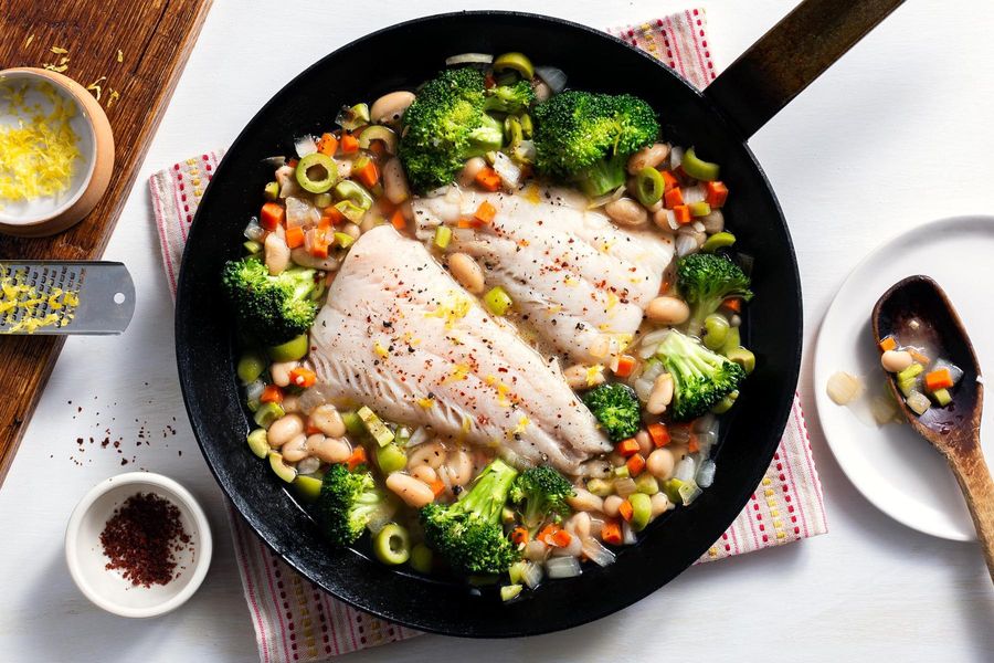 Quick-poached cod with broccoli, white beans, and olives