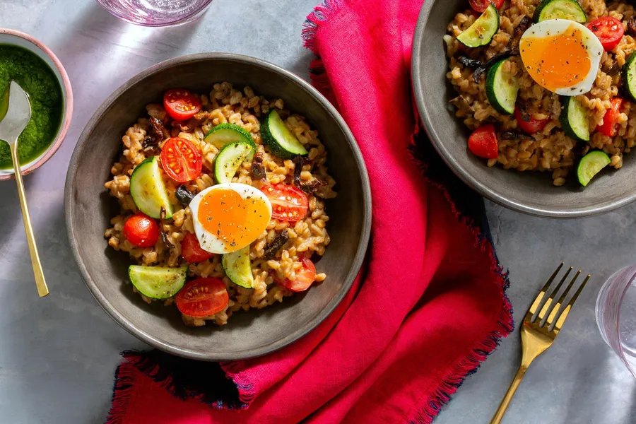 Farro risotto with zucchini, porcini mushrooms, and basil pistou