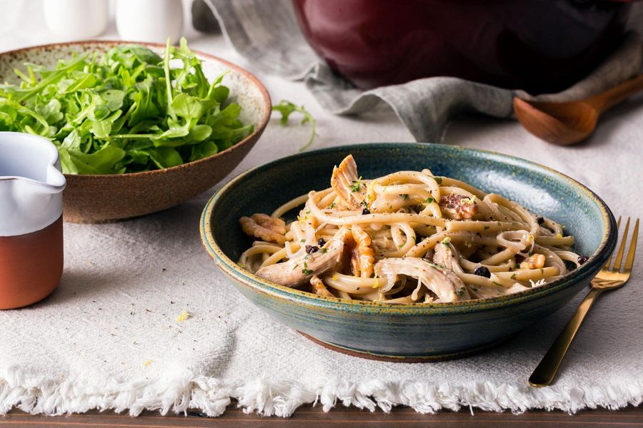 Sicilian-style chicken and bucatini with goat cheese, currants, and walnuts