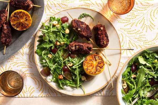 Greek souzoukaklia beef skewers with arugula-grape salad