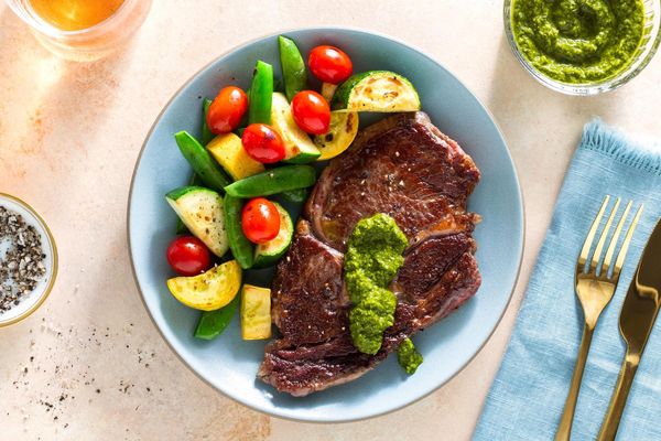 Seared salmon with chimichurri and Provençal vegetables