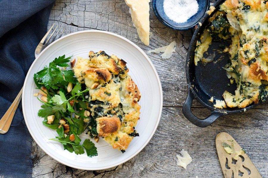 Spinach and kale strata with parsley salad 