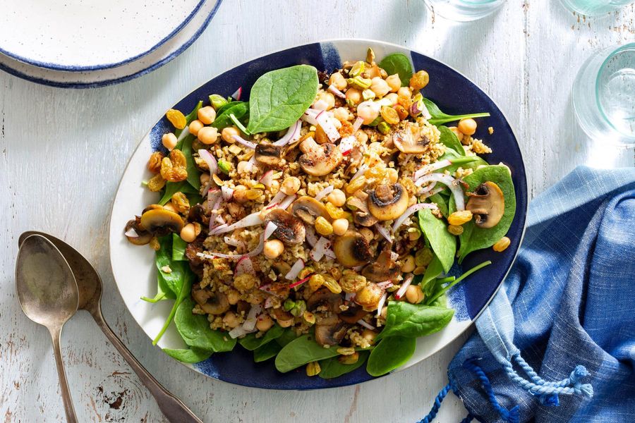 Mediterranean chickpea salad with freekeh, mushrooms, and pistachios