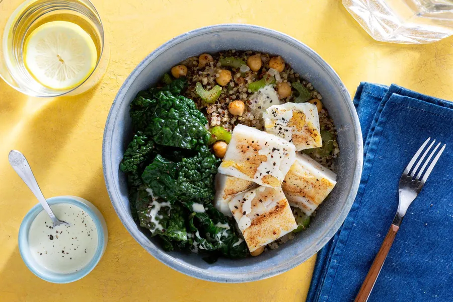 Quinoa bowls with wilted greens and citrus dressing