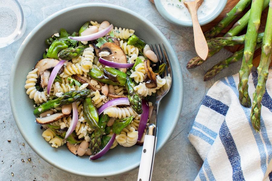 Quinoa pasta salad with asparagus and basil-yogurt dressing