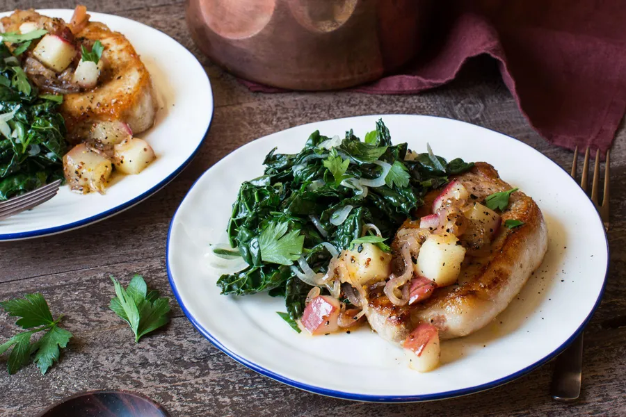 Pork chops with pear mostarda and wilted garlicky greens