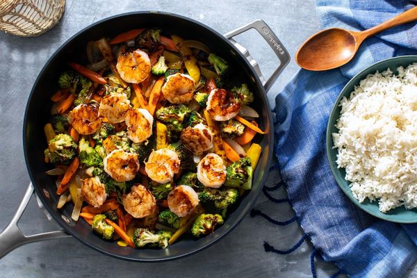 Hot and sour chicken stir-fry with vegetables and long-grain rice