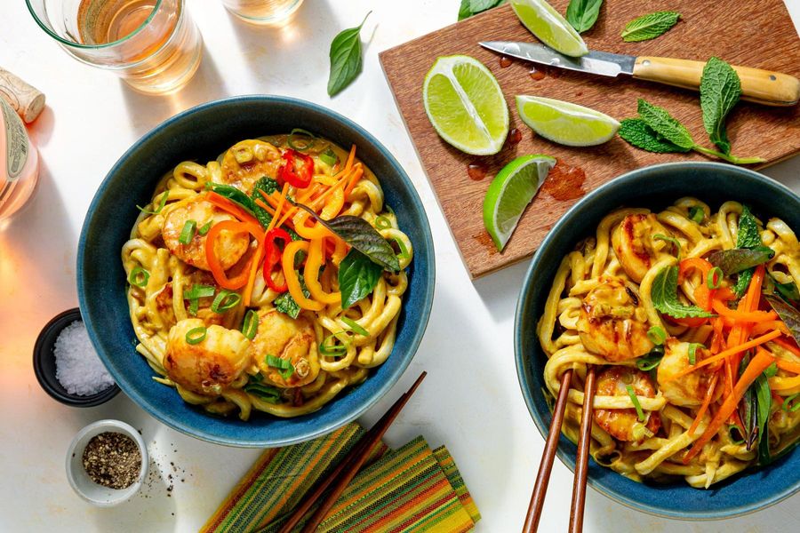 Pork cashew curry with udon and fresh herb salad