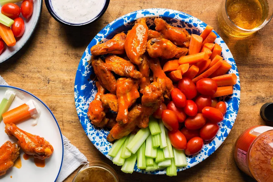 Buffalo Chicken Wings with Crunchy Vegetables and Ranch Dressing