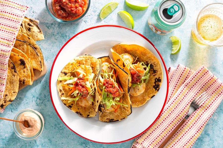 Tacos with cabbage slaw, salsa roja, and chipotle yogurt