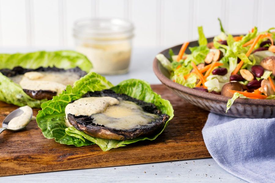 Lettuce-wrapped portobello burgers with horseradish mayo and bean-almond salad