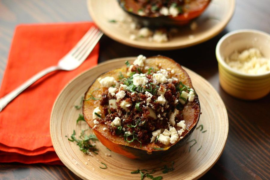 Quinoa-stuffed acorn squash, with apples and leeks