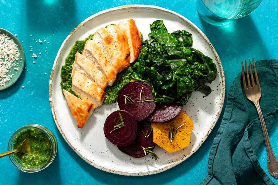 Chicken breasts and parsley-pecan pesto with roasted beet and orange