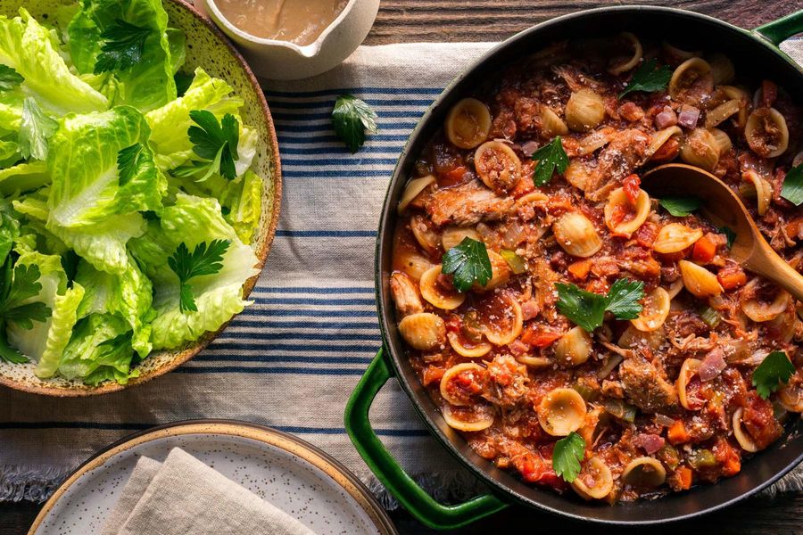 Pulled pork sugo with orecchiette and romaine-parsley salad