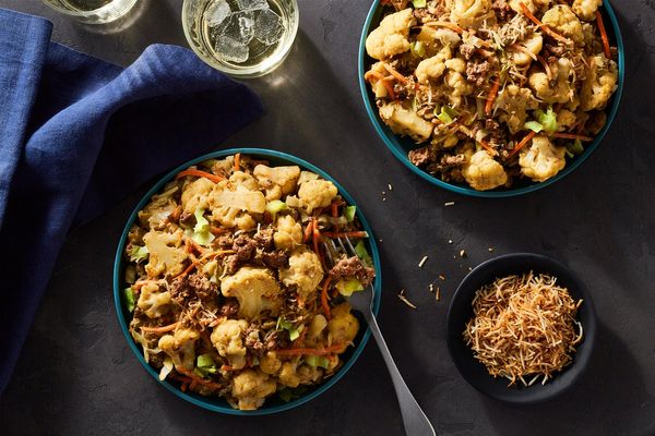 Cashew-lime curry with ground pork, cauliflower, and toasted coconut