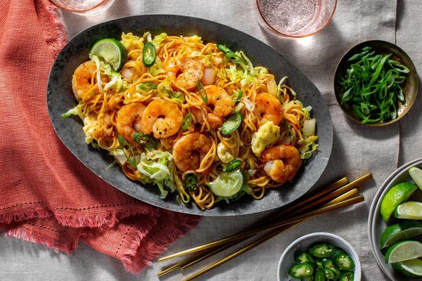 Pork mee goreng with fresh ramen, cabbage, and scrambled eggs