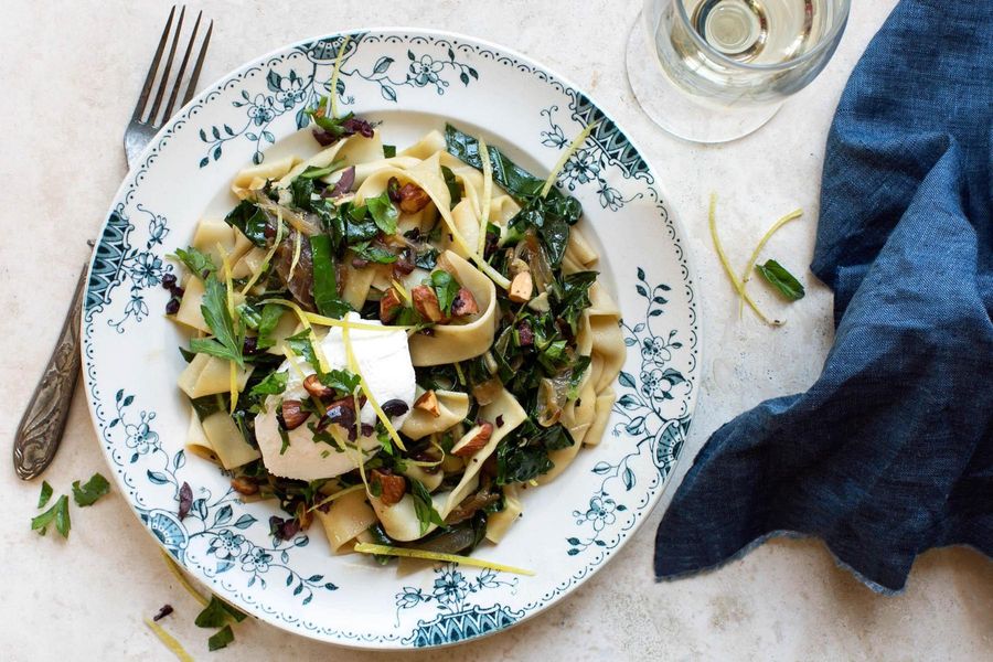 Pappardelle with collard greens, ricotta, and almond-olive relish