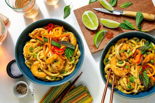 Pork cashew curry with udon and fresh herb salad