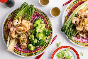Honey-walnut tempura shrimp with broccoli and charred romaine