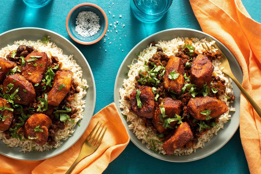 Blackened pollock with black beans and chile-lime salsa over brown rice