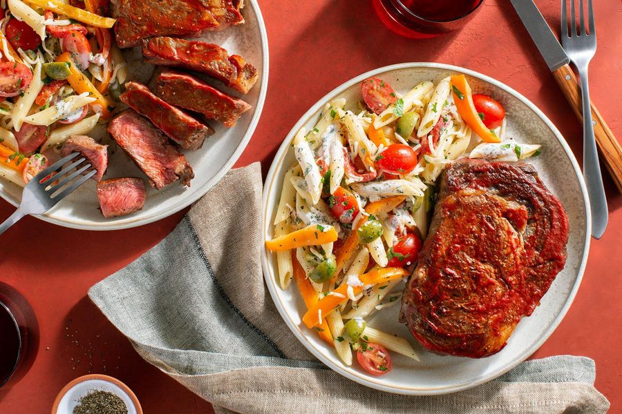 BBQ Black Angus steaks and Italian pasta salad with peppers two ways