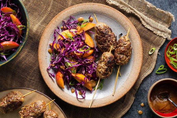 Korean beef skewers with sesame-cabbage slaw