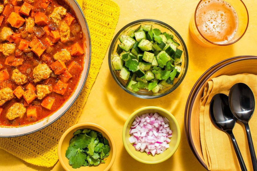 Chipotle chili with sweet potato and sumac-cucumber salad