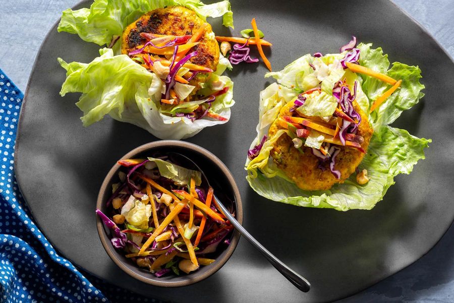 Lettuce-wrapped lemongrass salmon burgers with crunchy Asian slaw