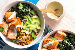 Citrusy quinoa bowls with salmon and wilted greens
