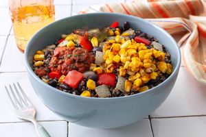 Zesty black bean–quinoa bowl with corn and salsa roja