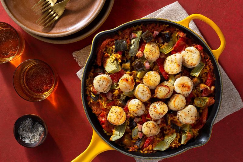 Seared Sea Scallops over Pancetta, Eggplant, and Artichoke Paella Sunbasket