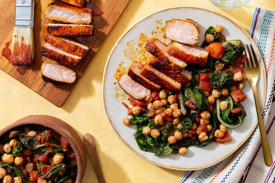 Honey-harissa pork chops with Moroccan-spiced chickpeas and chard
