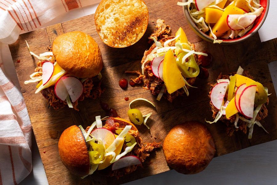 Spicy barbacoa pulled-pork sliders with mango slaw