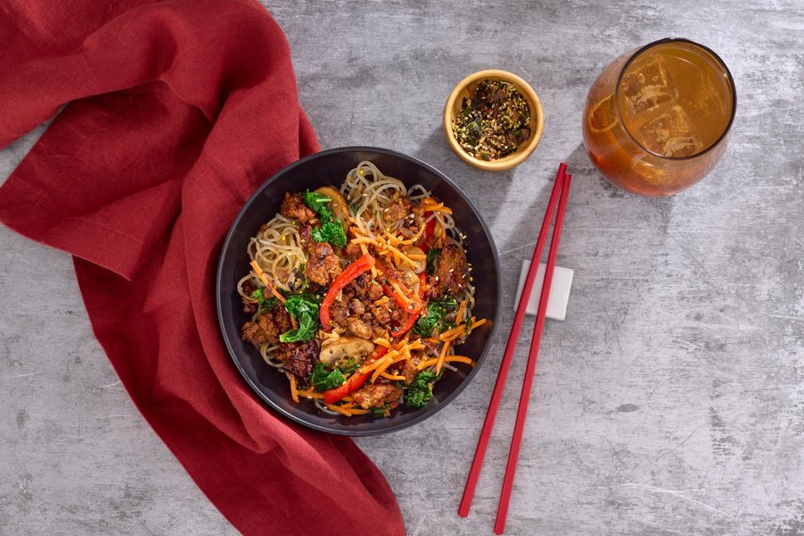 Beef japchae bowl with glass noodles, kale, and mushrooms