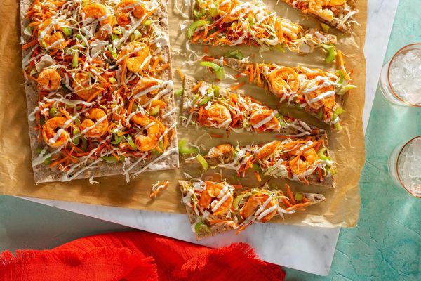 Buffalo chicken flatbreads with celery-carrot salad and ranch dressing