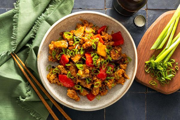 Five-spice pork and eggplant stir-fry with cashew-plum sauce