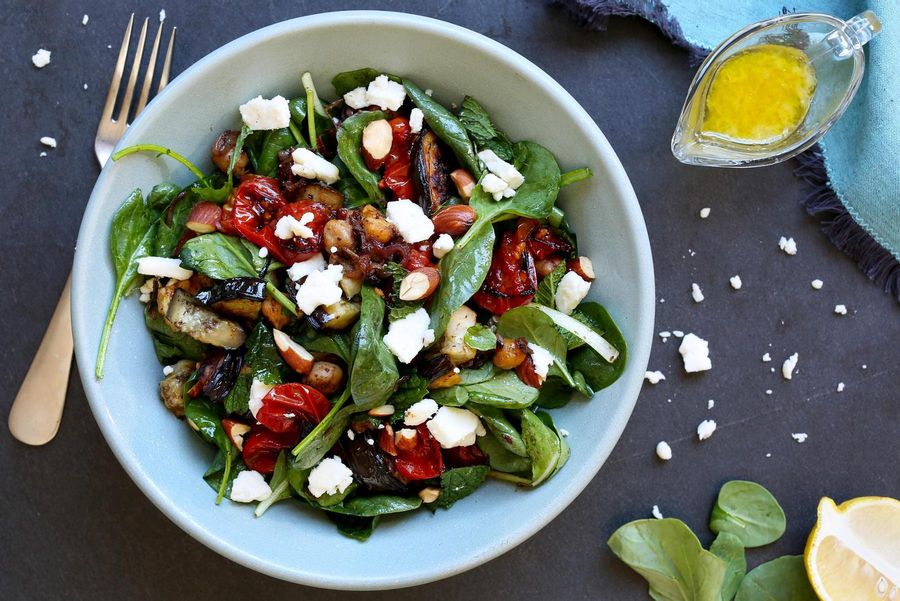 Spinach salad with grilled eggplant, roasted tomatoes and chickpeas 