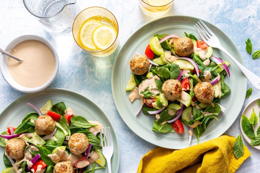 Greek salad with lemon-tahini dressing and your choice of protein