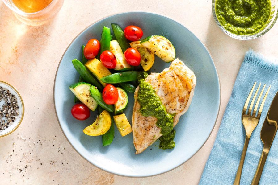 Seared salmon with chimichurri and Provençal vegetables
