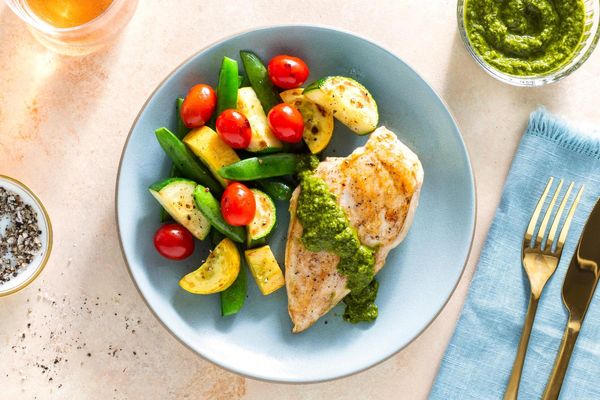 Seared salmon with chimichurri and Provençal vegetables