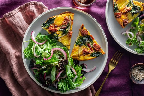 Chorizo, chard, and potato frittata with mixed green salad
