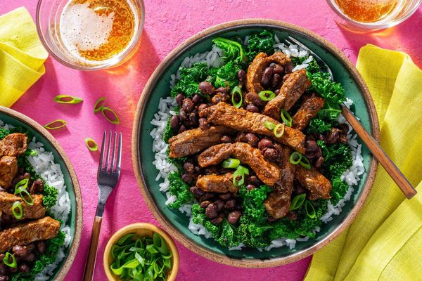 Mexican pork and beans with tomatillo sauce, rice, and kale