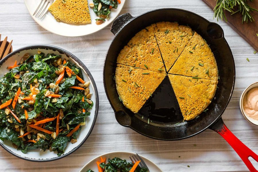 Chickpea socca flatbreads with harissa yogurt, kale salad, and almonds