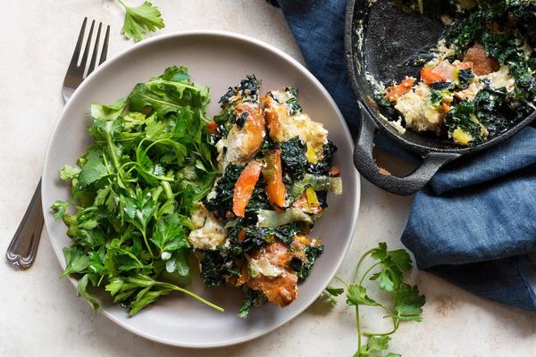 Kale, ricotta, and carrot gratin with parsley-arugula salad