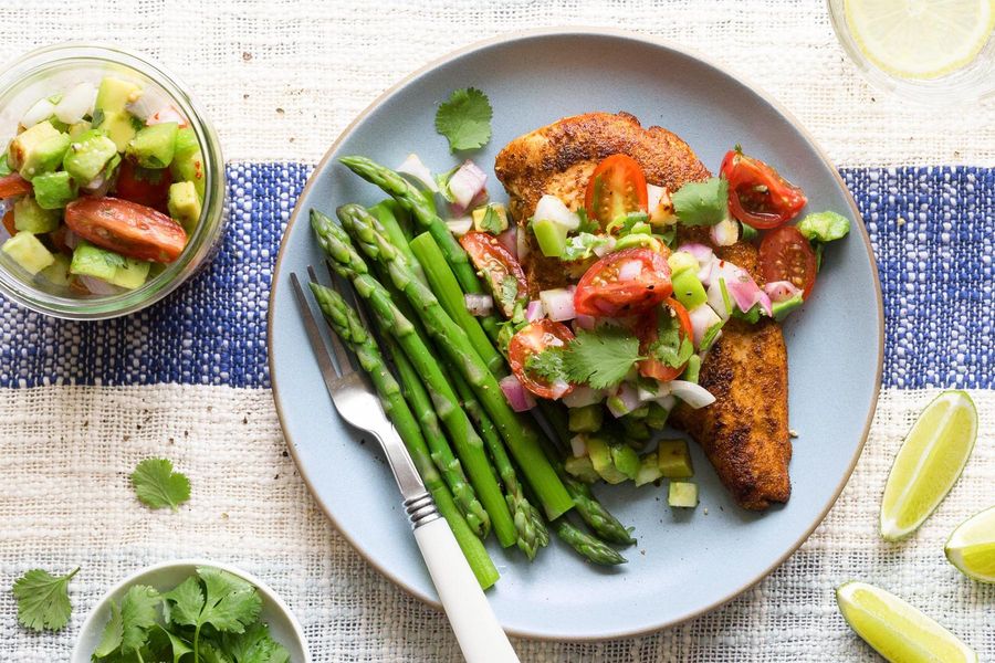 Chile-rubbed chicken breasts with tomatillo-avocado salsa and asparagus